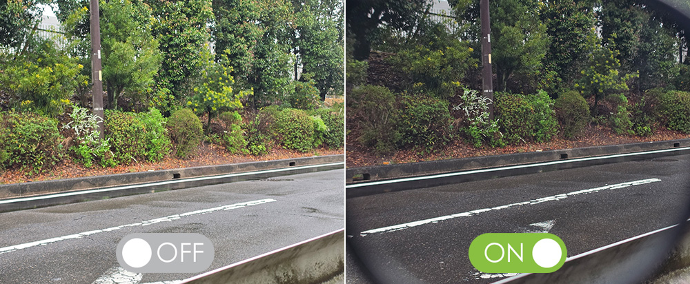 偏光調光グラス着用時の雨天ドライブでの見え方。雨の日の路面の照り返しが軽減されたイメージ